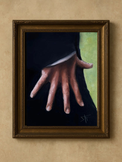 A framed painting on a textured beige wall, depicting a hand reaching out against a dark background with a light green vertical section. The artwork is housed in an ornate dark brown wooden frame.